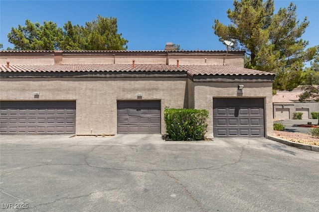 5250 S Rainbow Blvd Unit 2101, Las Vegas, NV 89118 - view of front of home with stucco siding