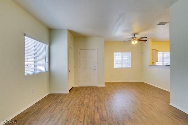 5250 S Rainbow Blvd Unit 2101, Las Vegas, NV 89118 - spare room with wood finished floors and a ceiling fan