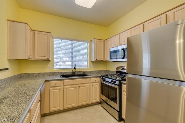 5250 S Rainbow Blvd Unit 2101, Las Vegas, NV 89118 - kitchen featuring appliances with stainless steel finishes, light brown cabinets, and light tile patterned floors