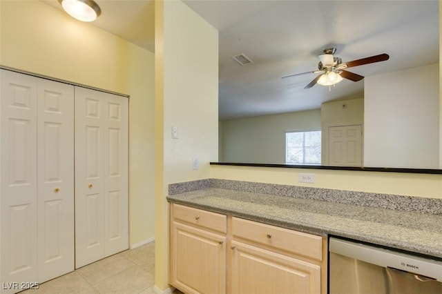 5250 S Rainbow Blvd Unit 2101, Las Vegas, NV 89118 - kitchen featuring stainless steel dishwasher, light brown cabinetry, light tile patterned floors, a ceiling fan, and light stone counters