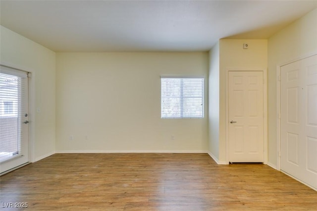 5250 S Rainbow Blvd Unit 2101, Las Vegas, NV 89118 - spare room featuring healthy amount of natural light and light wood-style flooring