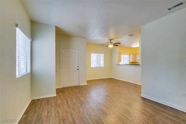 5250 S Rainbow Blvd Unit 2101, Las Vegas, NV 89118 - unfurnished room with wood finished floors and ceiling fan
