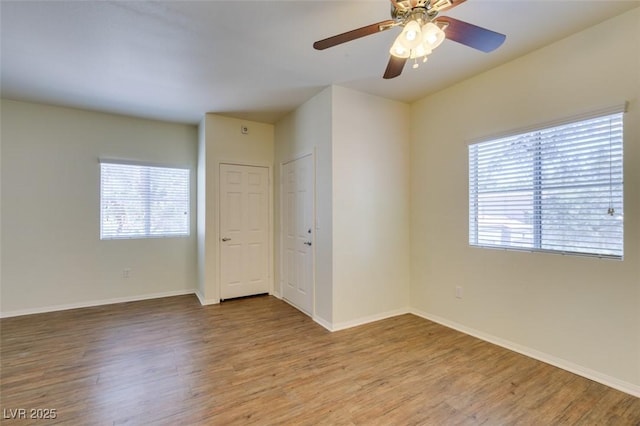 5250 S Rainbow Blvd Unit 2101, Las Vegas, NV 89118 - unfurnished room with wood finished floors and a ceiling fan