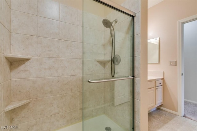 5250 S Rainbow Blvd Unit 2101, Las Vegas, NV 89118 - full bathroom with tiled shower, vanity, and tile patterned flooring