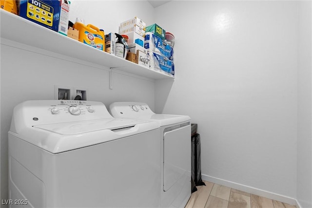 55 Strada Fontana, Henderson, NV 89011 - washroom featuring independent washer and dryer and light wood-style flooring