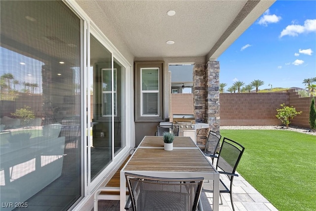 55 Strada Fontana, Henderson, NV 89011 - view of patio / terrace featuring a grill and outdoor dining area