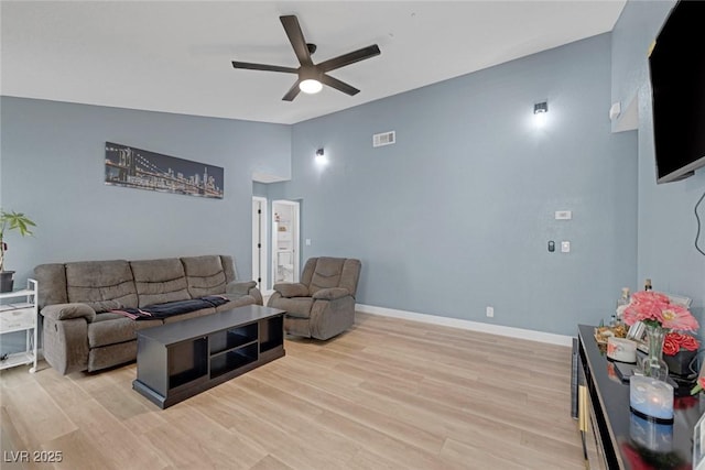 59 N Christy Ln, Las Vegas, NV 89110 - living area with ceiling fan, lofted ceiling, and light wood-style flooring