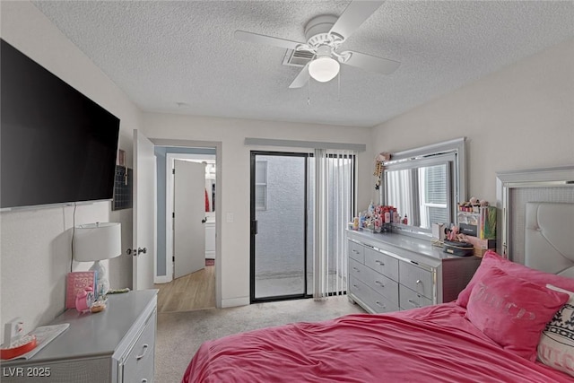 59 N Christy Ln, Las Vegas, NV 89110 - bedroom with access to exterior, a textured ceiling, light carpet, and a ceiling fan