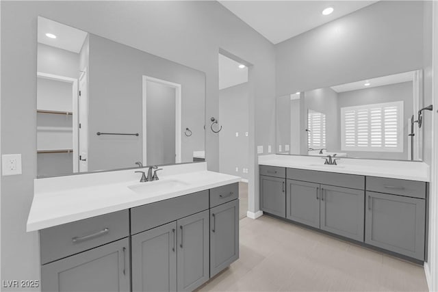 11909 Pippa Ave, Las Vegas, NV 89138 - full bathroom with two vanities and recessed lighting
