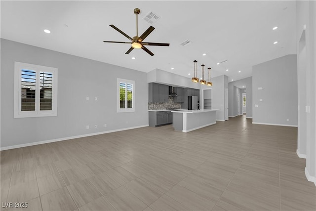 11909 Pippa Ave, Las Vegas, NV 89138 - unfurnished living room featuring a ceiling fan and recessed lighting
