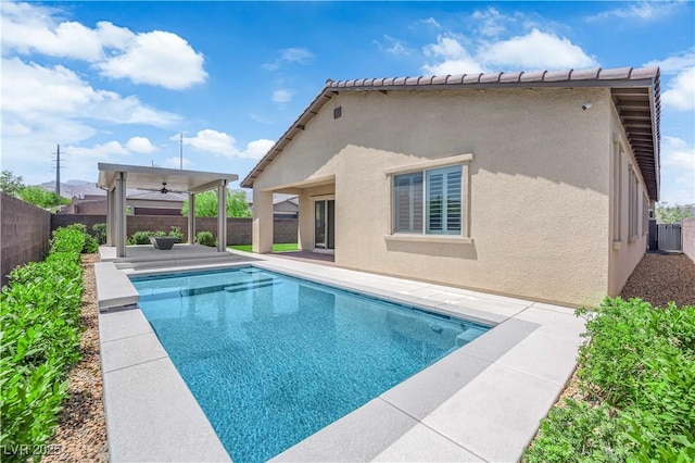 11909 Pippa Ave, Las Vegas, NV 89138 - view of pool with a fenced backyard, a patio area, and a ceiling fan