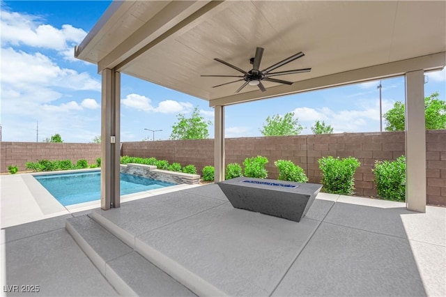 11909 Pippa Ave, Las Vegas, NV 89138 - fenced backyard with a patio and ceiling fan