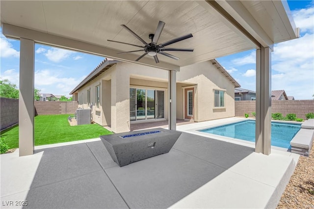 11909 Pippa Ave, Las Vegas, NV 89138 - view of pool featuring a patio, ceiling fan, a fenced backyard, and a fire pit
