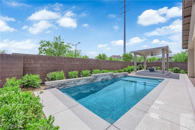 11909 Pippa Ave, Las Vegas, NV 89138 - view of pool with a fenced backyard, a ceiling fan, and a patio area