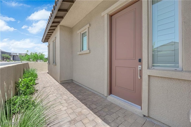 11909 Pippa Ave, Las Vegas, NV 89138 - entrance to property featuring stucco siding and a patio area