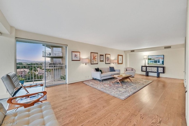 3111 Bel Air Dr Unit 7D, Las Vegas, NV 89109 - living area with wood finished floors