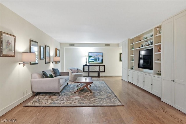 3111 Bel Air Dr Unit 7D, Las Vegas, NV 89109 - living area with wood finished floors