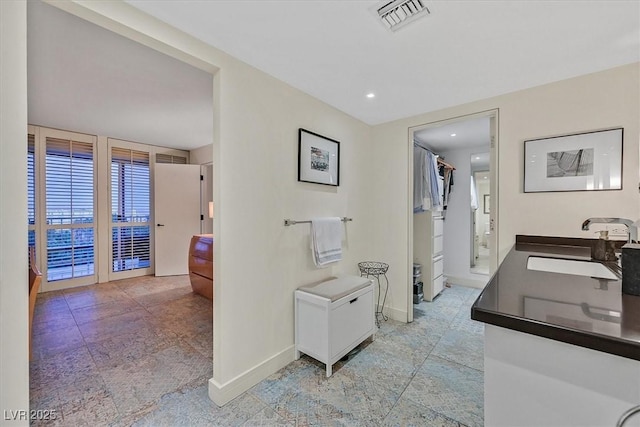 3111 Bel Air Dr Unit 7D, Las Vegas, NV 89109 - corridor featuring light tile patterned floors and recessed lighting