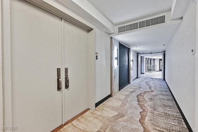 3111 Bel Air Dr Unit 7D, Las Vegas, NV 89109 - hall with light colored carpet and baseboards