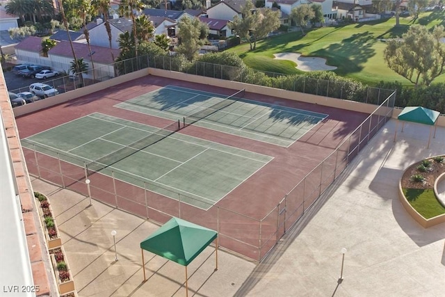3111 Bel Air Dr Unit 7D, Las Vegas, NV 89109 - view of tennis court with a residential view