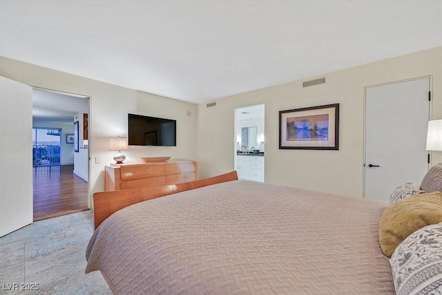 3111 Bel Air Dr Unit 7D, Las Vegas, NV 89109 - bedroom with ensuite bathroom