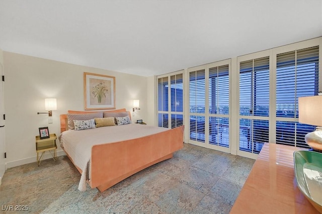 3111 Bel Air Dr Unit 7D, Las Vegas, NV 89109 - bedroom with baseboards