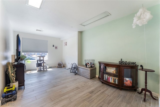 2990 Carnelian St, Las Vegas, NV 89121 - sitting room with wood finished floors