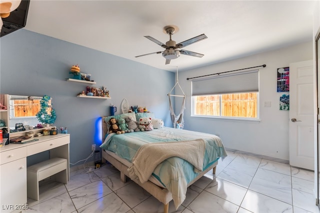 2990 Carnelian St, Las Vegas, NV 89121 - bedroom featuring light marble finish floors and ceiling fan