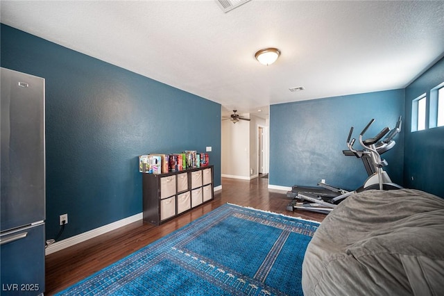 7021 Salt Marsh Ct, Las Vegas, NV 89148 - workout room with wood finished floors and a ceiling fan
