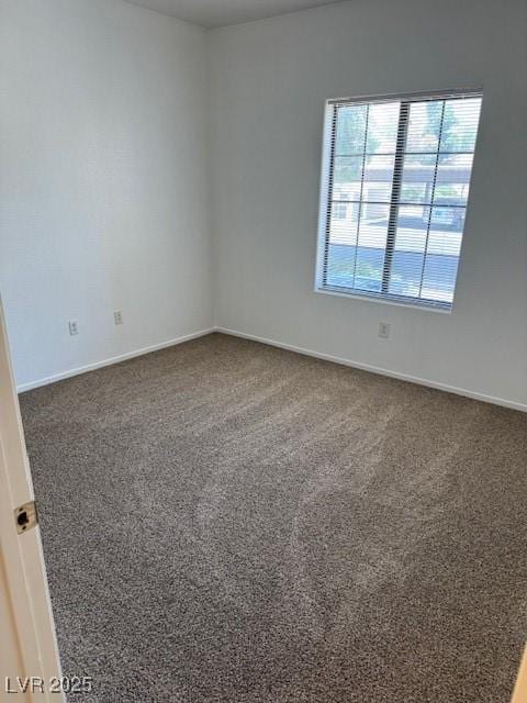 2019 Rancho Lake Dr Unit 102, Las Vegas, NV 89108 - unfurnished room featuring carpet floors and baseboards