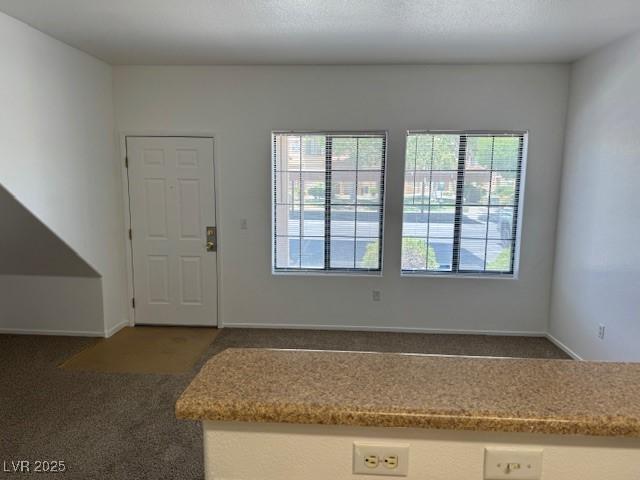 2019 Rancho Lake Dr Unit 102, Las Vegas, NV 89108 - carpeted entrance foyer featuring baseboards