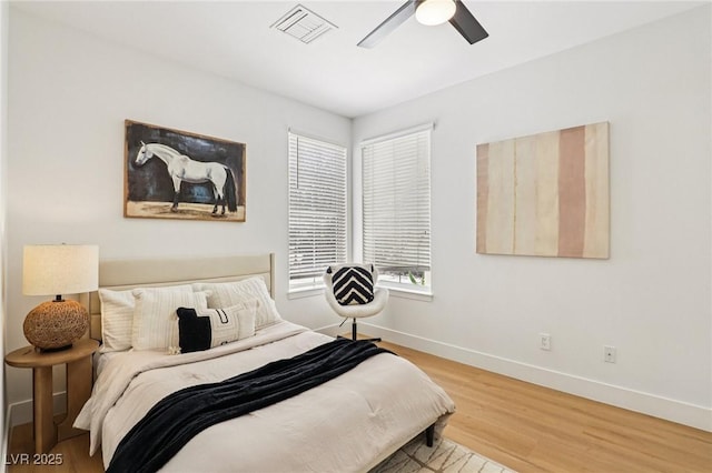 2469 Sun Reef Rd, Las Vegas, NV 89128 - bedroom featuring wood finished floors and a ceiling fan