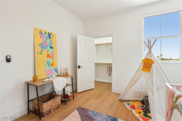 2469 Sun Reef Rd, Las Vegas, NV 89128 - rec room with wood finished floors and baseboards