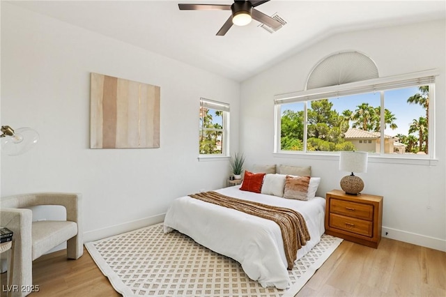 2469 Sun Reef Rd, Las Vegas, NV 89128 - bedroom featuring vaulted ceiling, light wood-style flooring, and ceiling fan