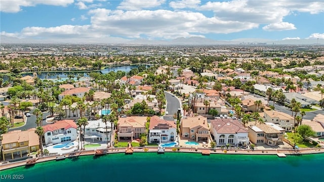 2469 Sun Reef Rd, Las Vegas, NV 89128 - aerial perspective of suburban area with a large body of water