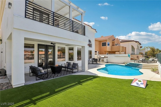 2469 Sun Reef Rd, Las Vegas, NV 89128 - rear view of property with a balcony, stucco siding, and a patio