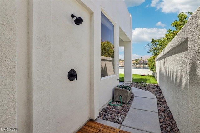 2469 Sun Reef Rd, Las Vegas, NV 89128 - view of side of home with stucco siding and a water view