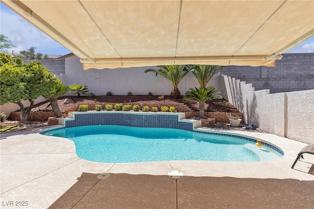 4435 Peaceful Harbor St, Las Vegas, NV 89129 - view of swimming pool featuring a fenced backyard and a patio area