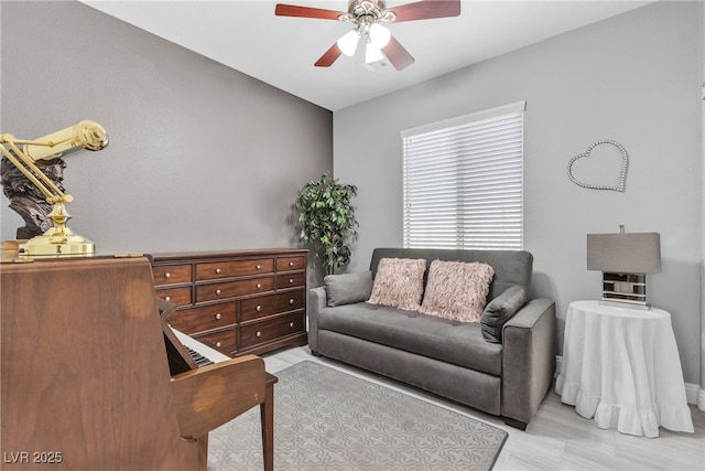 4435 Peaceful Harbor St, Las Vegas, NV 89129 - living area featuring ceiling fan and baseboards