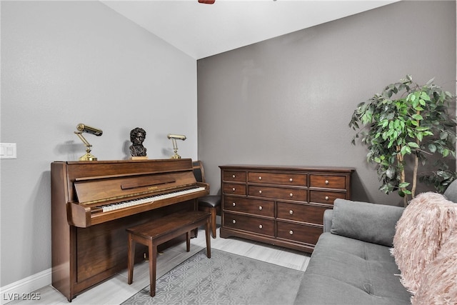 4435 Peaceful Harbor St, Las Vegas, NV 89129 - living area with lofted ceiling, ceiling fan, and light wood finished floors