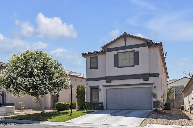 4435 Peaceful Harbor St, Las Vegas, NV 89129 - view of front of home with driveway, stucco siding, a garage, and a tile roof