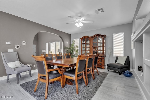 4435 Peaceful Harbor St, Las Vegas, NV 89129 - dining room with ceiling fan and arched walkways