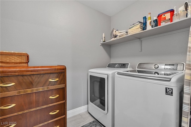 4435 Peaceful Harbor St, Las Vegas, NV 89129 - washroom with washing machine and dryer and baseboards