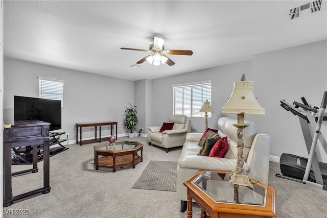 4435 Peaceful Harbor St, Las Vegas, NV 89129 - living room with healthy amount of natural light, ceiling fan, and carpet