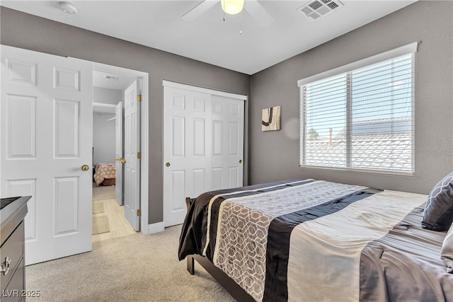 4435 Peaceful Harbor St, Las Vegas, NV 89129 - bedroom featuring light colored carpet, a closet, and ceiling fan
