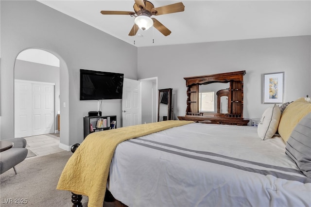 4435 Peaceful Harbor St, Las Vegas, NV 89129 - bedroom featuring carpet, vaulted ceiling, arched walkways, and a ceiling fan