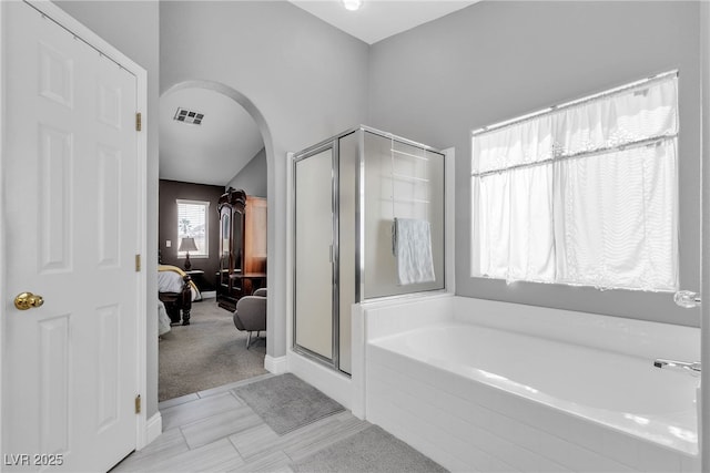4435 Peaceful Harbor St, Las Vegas, NV 89129 - ensuite bathroom with a stall shower and a garden tub