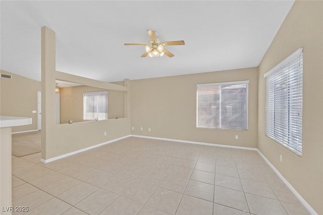 7920 Turtle Island Ct, Las Vegas, NV 89129 - unfurnished room featuring a ceiling fan, light tile patterned floors, and healthy amount of natural light
