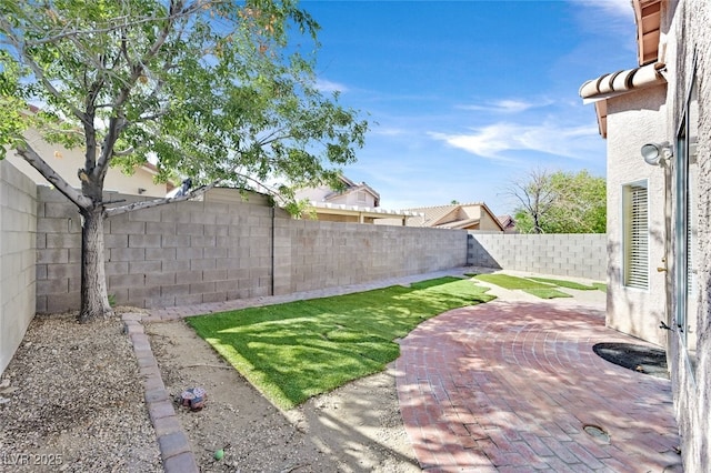 7920 Turtle Island Ct, Las Vegas, NV 89129 - fenced backyard with a patio area