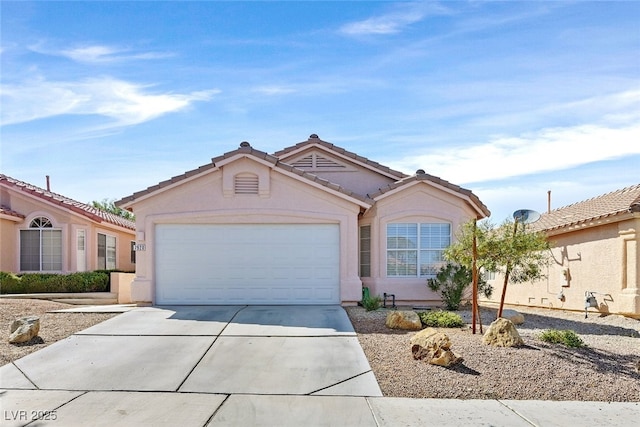 7920 Turtle Island Ct, Las Vegas, NV 89129 - ranch-style house with an attached garage, driveway, stucco siding, and a tile roof